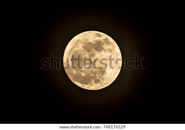 November 03,2017 : Full\
Moon detailed closeup black background of space.image taken at\
Thailand.