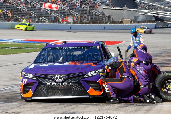 November 04, 2018 - Ft.\
Worth, Texas, USA: Denny Hamlin (11) brings his car down pit road\
for service during the AAA Texas 500 at Texas Motor Speedway in Ft.\
Worth, Texas.