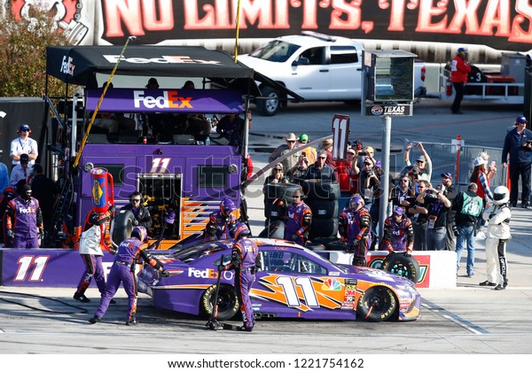November 04, 2018 - Ft. Worth,\
Texas, USA: Denny Hamlin (11) comes down pit road for service\
during the AAA Texas 500 at Texas Motor Speedway in Ft. Worth,\
Texas.
