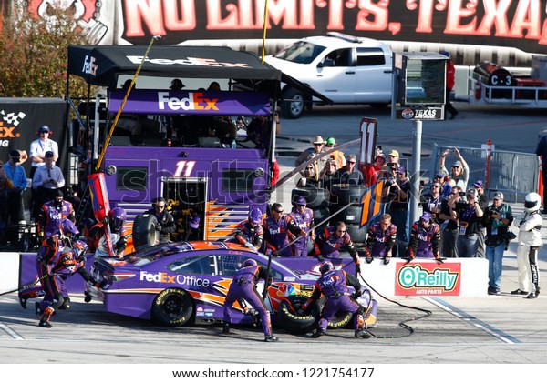 November 04, 2018 - Ft. Worth,\
Texas, USA: Denny Hamlin (11) comes down pit road for service\
during the AAA Texas 500 at Texas Motor Speedway in Ft. Worth,\
Texas.