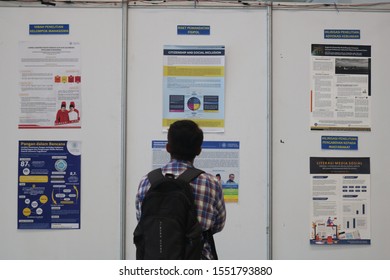 November 06, 2019, Sleman, Indonesia: Someone Is Looking At A Scientific Research Poster.