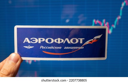 November 10, 2021, Moscow, Russia. Aeroflot Emblem Against The Background Of A Share Price Chart.