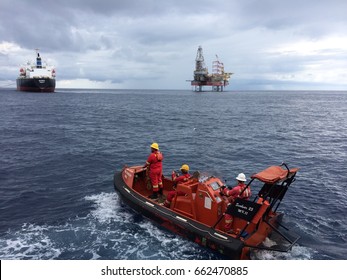 November 12, 2014 - Offshore Crew Onboard MV Perdana Expedition Rescue Boat For Man Overboard Emergency Training Rescue With Offshore Rig Named Maersk Convincer At South China Sea.