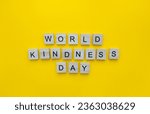 November 13, World Kindness Day, minimalistic banner with the inscription in wooden letters