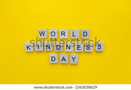 November 13, World Kindness Day, minimalistic banner with the inscription in wooden letters 商業照片 © 