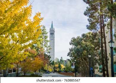 November 19, 2017 Berkeley/CA/USA - Autumn colored trees in the UC Berkeley campus; Sather Tower (Campanile) in the background