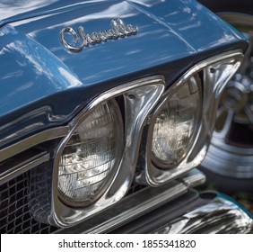 November 2020, Tampa, FL - Antique Blue Chevy Chevelle Logo And Headlights