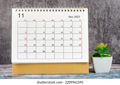 The November 2022 Monthly desk calendar for 2022 year with plant pot.