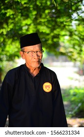 November 21, 2019 - Sabak Bernam, Malaysia. A Local Old Malay Man With His Traditional Martial Art Dress And Pose With The Village Green Background In Malaysia.