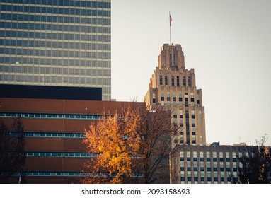 November 27, 2021 - Winston-Salem, NC, USA: Downtown business district. View of the buildings and tree with yellow leaves.