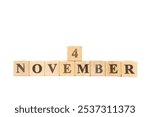 November 4, Wooden cube on isolated white background. Barack Obama, First African American President, First Harry Potter Premier in London, Ronald Reagan, 40th president, Unesco, National candy day