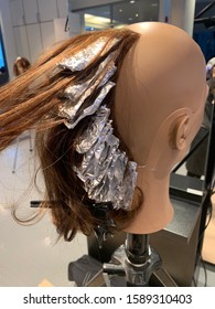 November 5, 2019, Norway, Tromsø -  Trying Hair Stripe With Aluminium Foil  On Practice Head