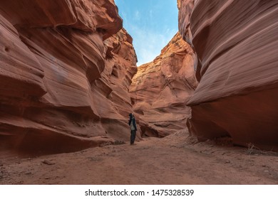 November 5th 2018.  Page, Arizona United States.  Hiker Explores A Portion Of Antelope Canyon. 