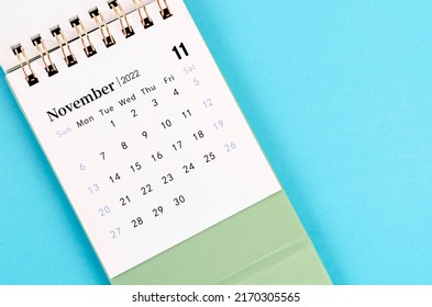 The November calendar 2022 on blue background.