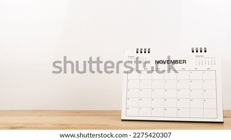 November calendar on wood desk white background.
Nov 2023 agenda. 