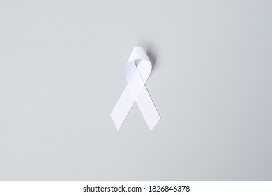 November Lung Cancer Awareness month, democracy and international peace day. white Ribbon on grey background - Powered by Shutterstock