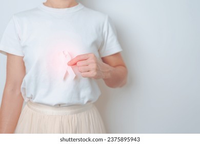 November Lung Cancer Awareness month. Woman having Chest pain with White ribbon. Healthcare and World Cancer day concept - Powered by Shutterstock