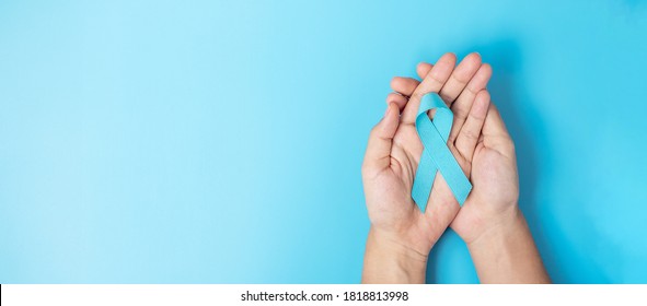 November Prostate Cancer Awareness month, Man holding light Blue Ribbon for supporting people living and illness. Healthcare, International men, Father, World cancer day and world diabetes day concept - Powered by Shutterstock