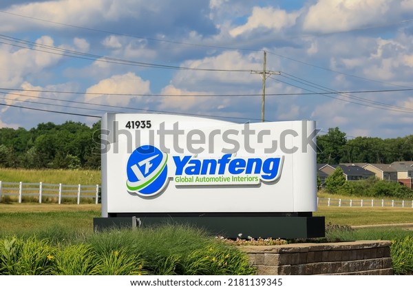 Novi, MI, USA - June 26, 2022: Signage of Yanfeng\
global automotive interiors company, One of the top 100 automotive\
suppliers in the world.