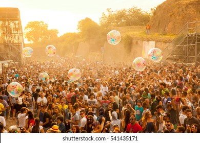NOVI SAD - JULY 12 : Crowd in the sunrise on Dj Arena dance stage at EXIT 2015 Music Festival July 12, 2015 in Novi Sad, Petrovaradin Fortress, Serbia