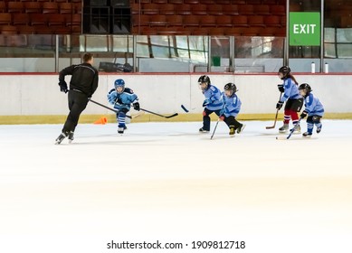 Novi Sad, Serbia - December 05, 2020 :Youth Ice Hockey Team From Novi Sad Trains With Their Coach