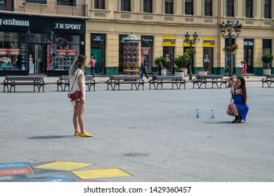 Novi Sad, Serbia June 19, 2019: Tourists From Asia Are Taking Photos Of Novi Sad