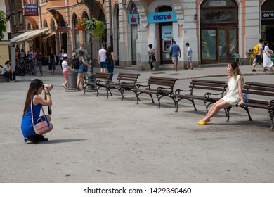 Novi Sad, Serbia June 19, 2019: Tourists From Asia Are Taking Photos Of Novi Sad