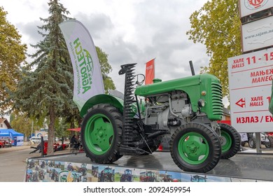 Novi Sad, Serbia - September 21, 2021: Retro Green Tractor Agro Tech Booth At Agriculture Expo Trade Fair.