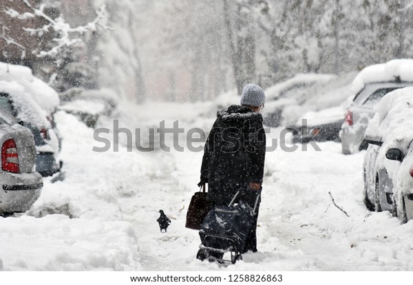 Novi Sad,Serbia 15.12.2018 Snow days in Seriba. Heavy\
snowfall in Serbia makes peoples more difficult and slowing down\
traffic 