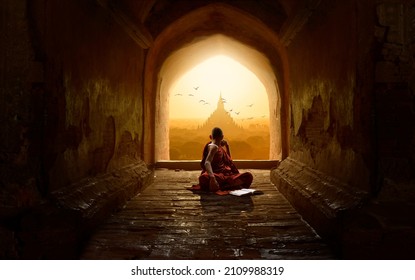 Novice buddhist monk inside a temple in the Bagan Valley