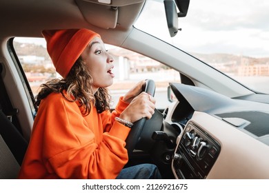 A Novice Girl Parks A Car During An Exam Or A Driving Lesson. A Small Accident And A Bumper Scratch Concept