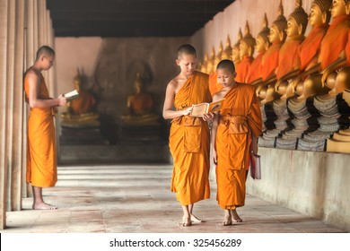 Novices At Ayutthaya Historical Park In Thailand