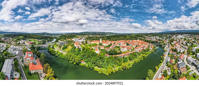 Novo Mesto Cityscape at Bend of the Krka River in Slovenia Lower Carniola Region. Aerial Drone View. - Shutterstock ID 2024897921