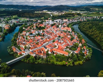 Novo Mesto Cityscape at Bend of the Krka River in Slovenia Lower Carniola Region. Aerial Drone View. - Shutterstock ID 2087501665