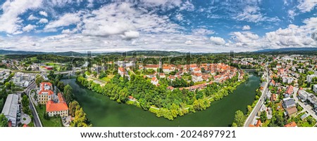 Novo Mesto Cityscape at Bend of the Krka River in Slovenia Lower Carniola Region. Aerial Drone View.