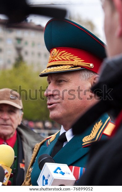 NOVOSIBIRSK - MAY 9: Commander of the 41st Army,\
Vasiliy Tonkoshkurov, gives interview after the parade of victory\
dedicated to the 66th of victory in World War II on May 9, 2011,\
Novosibirsk Russia