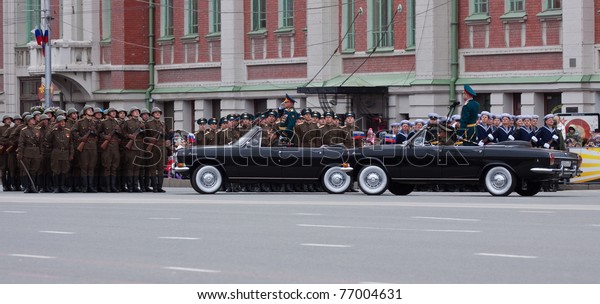 NOVOSIBIRSK - MAY 9: Commander\
of the 41st Army Vasiliy Tonkoshkurov  takes parade dedicated to\
Victory Day in Great Patriotic War on May 9, 2011, Novosibirsk\
Russia