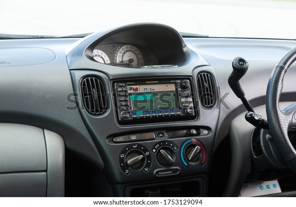 Novosibirsk/ Russia –June  03 2020: Toyota\
Funcargo ,close-up of the central control panel, monitor with music\
and radio , adjustment of the blower, air conditioner, player.\
modern car\
interior\
