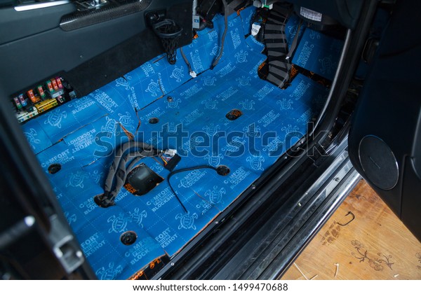 Novosibirsk,\
Russia - 09.09.2019: Car tuning in the body of a SUV using three\
layers of noise insulation Blockshot comfortmat premium. Audio and\
vibration isolation. Additional\
equipment.