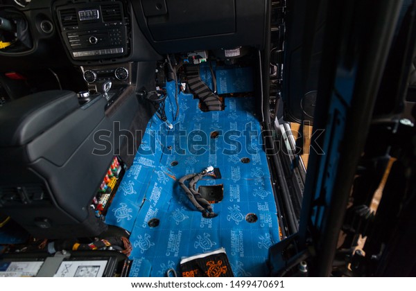 Novosibirsk,\
Russia - 09.09.2019: Car tuning in the body of a SUV using three\
layers of noise insulation Blockshot comfortmat premium. Audio and\
vibration isolation. Additional\
equipment.