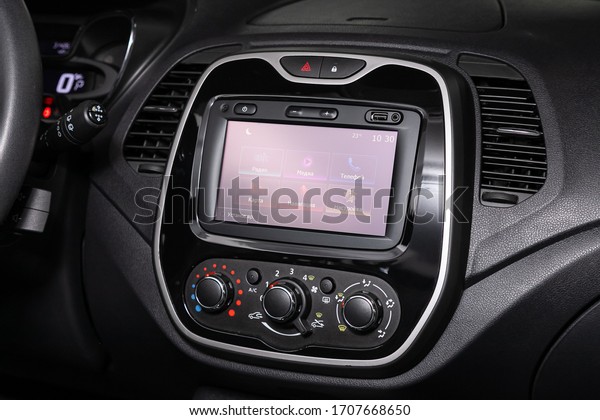 Novosibirsk/ Russia – April 02, 2020: \
Renault Kaptur, close-up of the central control panel, monitor with\
music and radio , adjustment of the blower, air conditioner,\
player. modern car\
interior\
\
