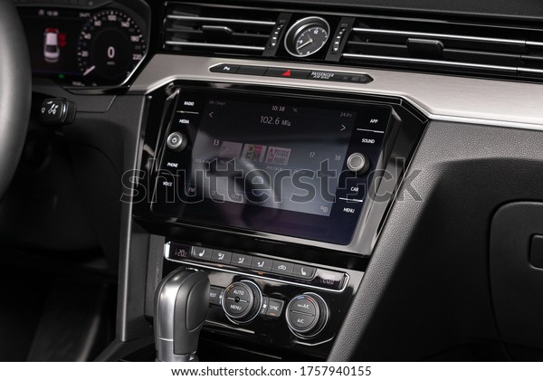 Novosibirsk/ Russia – April 02 2020:\
Volkswagen Passat, close-up of the central control panel, monitor\
with music and radio , adjustment of the blower, air conditioner,\
player. modern car\
interior\
