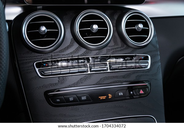 Novosibirsk/ Russia – April 06, 2020: Mercedes-Benz
GLC-class , close-up of the central control panel, monitor with
music and radio , adjustment of the blower, air conditioner,
player.  Inside
car
