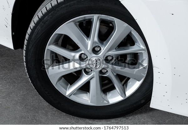 Novosibirsk/ Russia – April 22 2020: Toyota\
Corolla, Car wheel with alloy wheel and new rubber on a car\
closeup. Wheel tuning\
disc\
