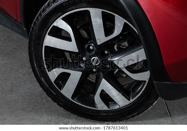 Novosibirsk/ Russia – April 28  2020: Nissan Juke,\
 Car wheel with alloy wheel and new rubber on a car closeup. Wheel\
tuning disc\
