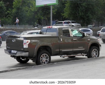 Novosibirsk, Russia, August 05 2013: Private Brown Metallic Color Japanese Usdm Us Usa Pick-up Truck Car SUV Old 2000s Toyota Tundra SR5 Frame Crossover Import Export Made In USA Parking City Street