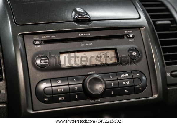 Novosibirsk, Russia – August 19, 2019: Nissan\
Note , Modern black car interior: radio, audio system with monitor \
and control\
buttons\

