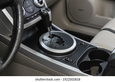 Novosibirsk, Russia – February 18 2021: MAZDA CX-7, Close up of the manual gearbox transmission handle. Accelerator handle and buttons in a new car. 
