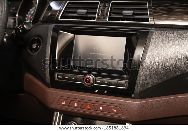 Novosibirsk, Russia – January 05, 2020:  \
Lifan Myway,  close-up of the central control panel, monitor with\
music and radio , adjustment of the blower, air conditioner,\
player. modern car\
interior\
\
