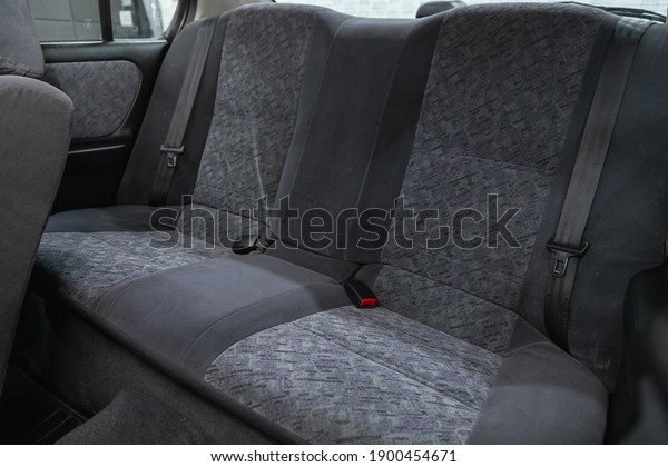 Novosibirsk,\
Russia – January 14 2021: Nissan Primera, Rear seat for passengers\
in black textile. Comfort car\
inside.\
